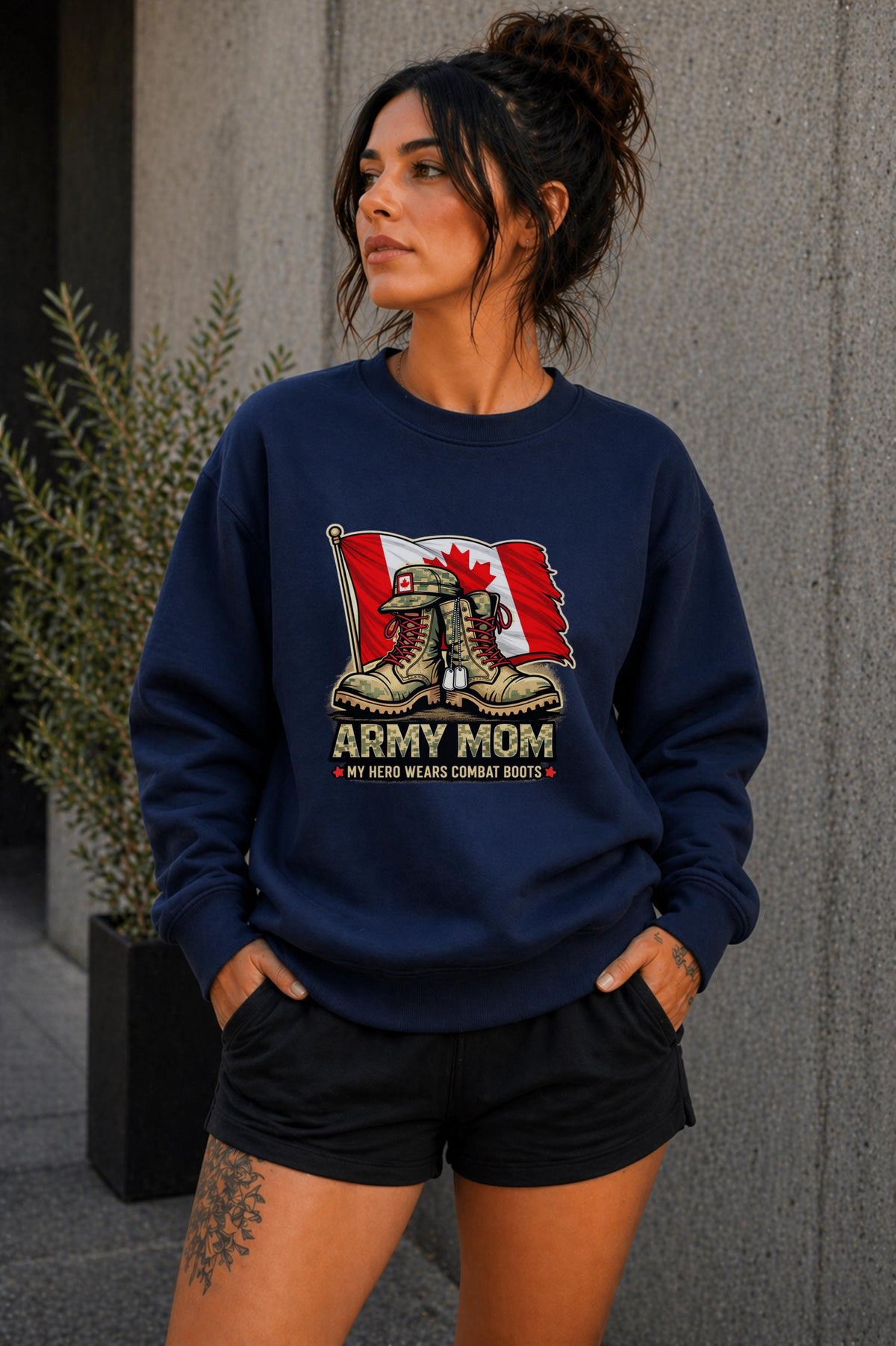 Woman wearing black crewneck sweatshirt with Army Mom design featuring combat boots and Canadian flag, patriotic military mom sweater, casual fall outfit