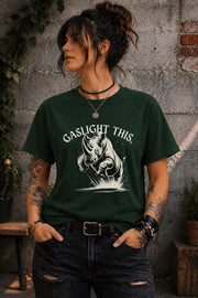 Edgy woman model in ripped jeans wearing funny gaslight this slogan shirt lifestyle mockup