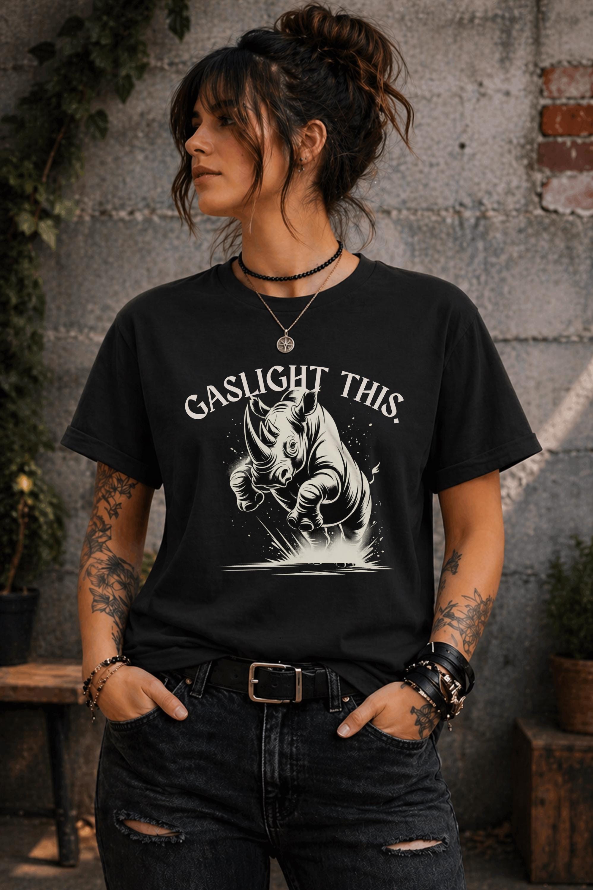 Edgy woman model in ripped jeans wearing funny gaslight this slogan shirt lifestyle mockup