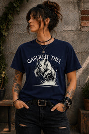 Edgy woman model in ripped jeans wearing funny gaslight this slogan shirt lifestyle mockup