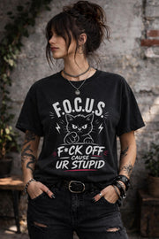 Woman wearing dark gray sarcastic cat graphic t-shirt with bold funny text outdoors