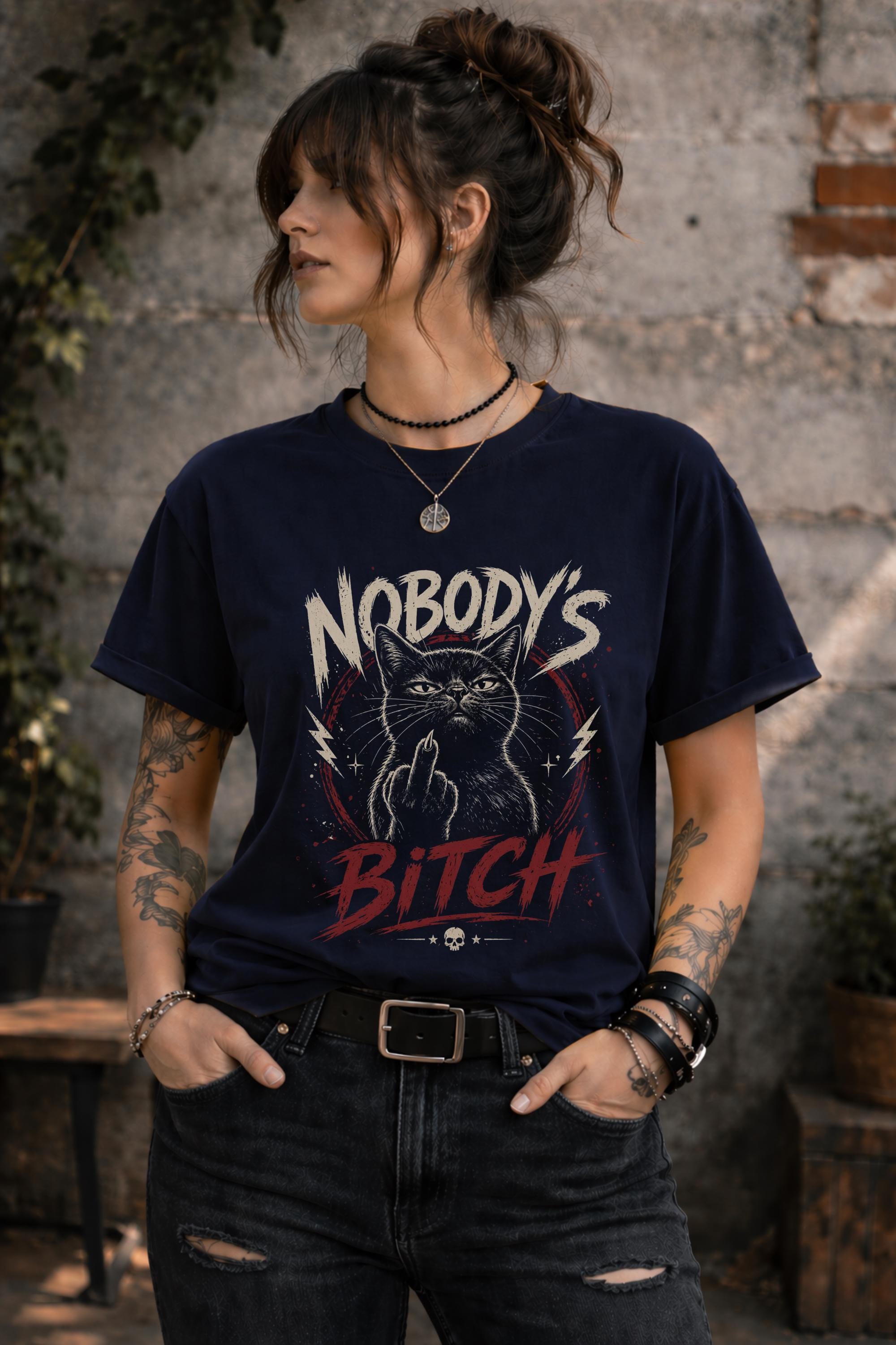 Close up of edgy cat illustration flipping off with bold text on dark shirt