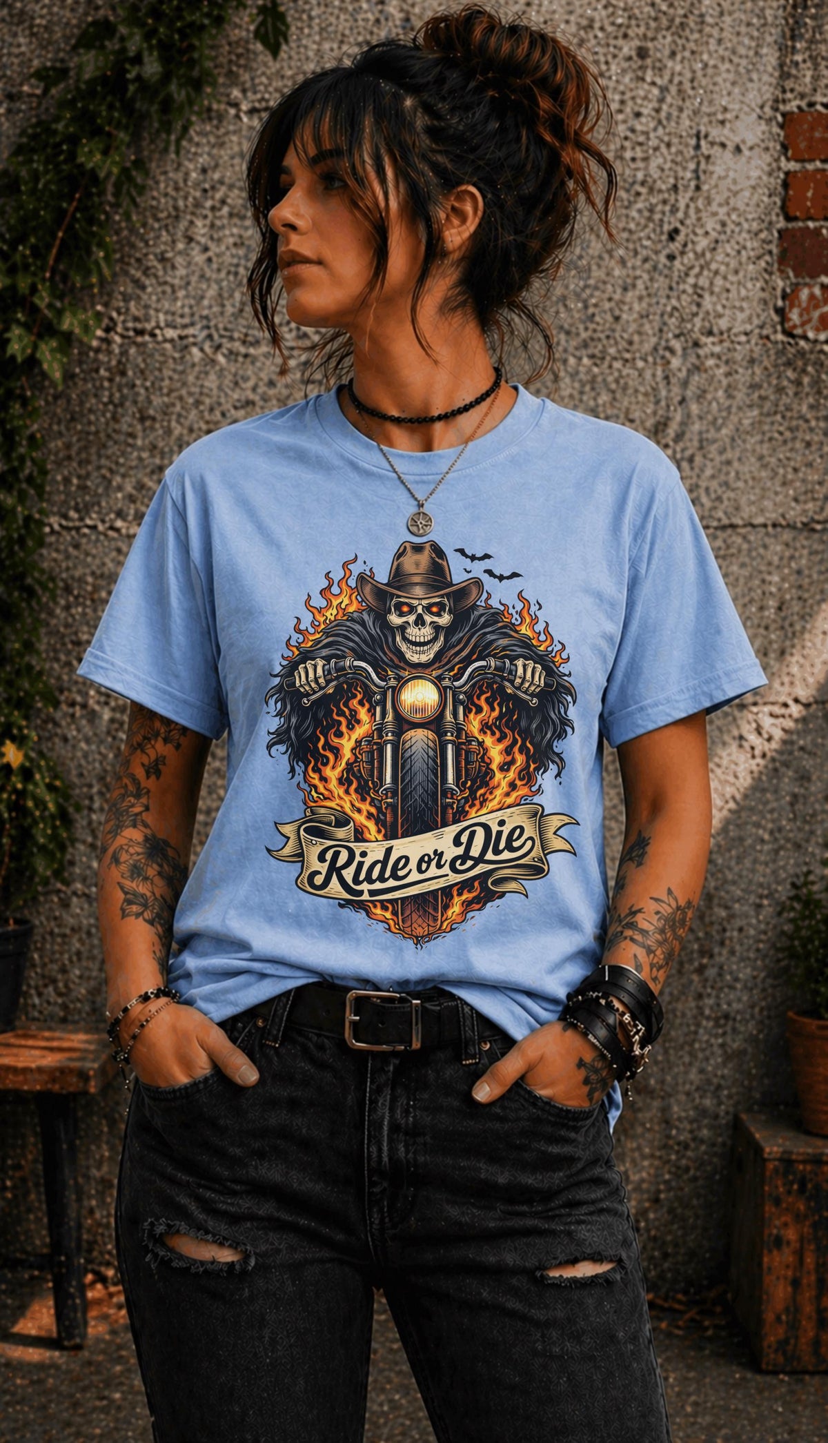 Edgy outfit with motorcycle graphic tee and ripped jeans lifestyle mockup