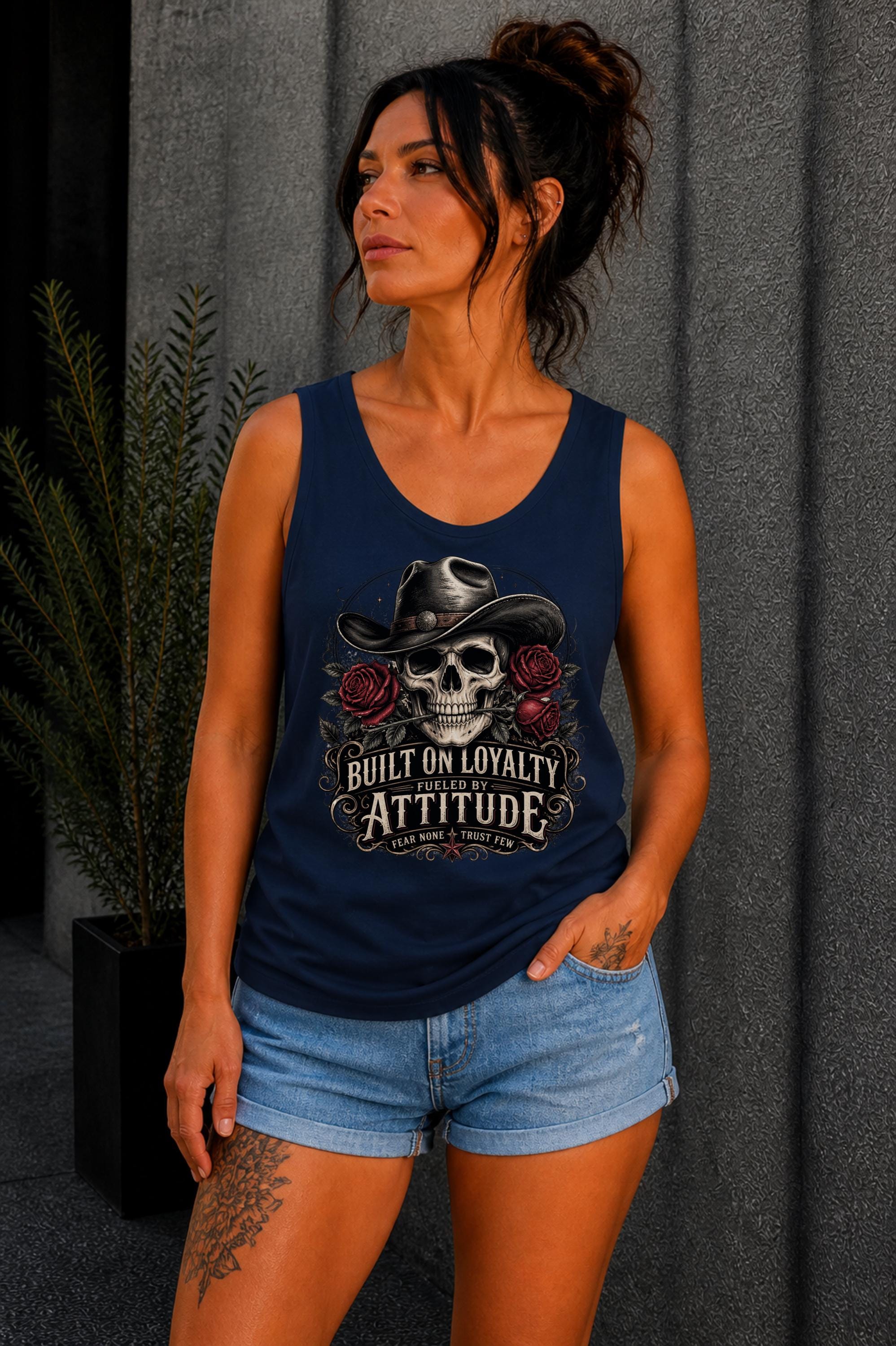 Tank-Top featuring cowboy skull with hat and red roses, Built on Loyalty Fueled by Attitude graphic, styled with edgy casual outfit