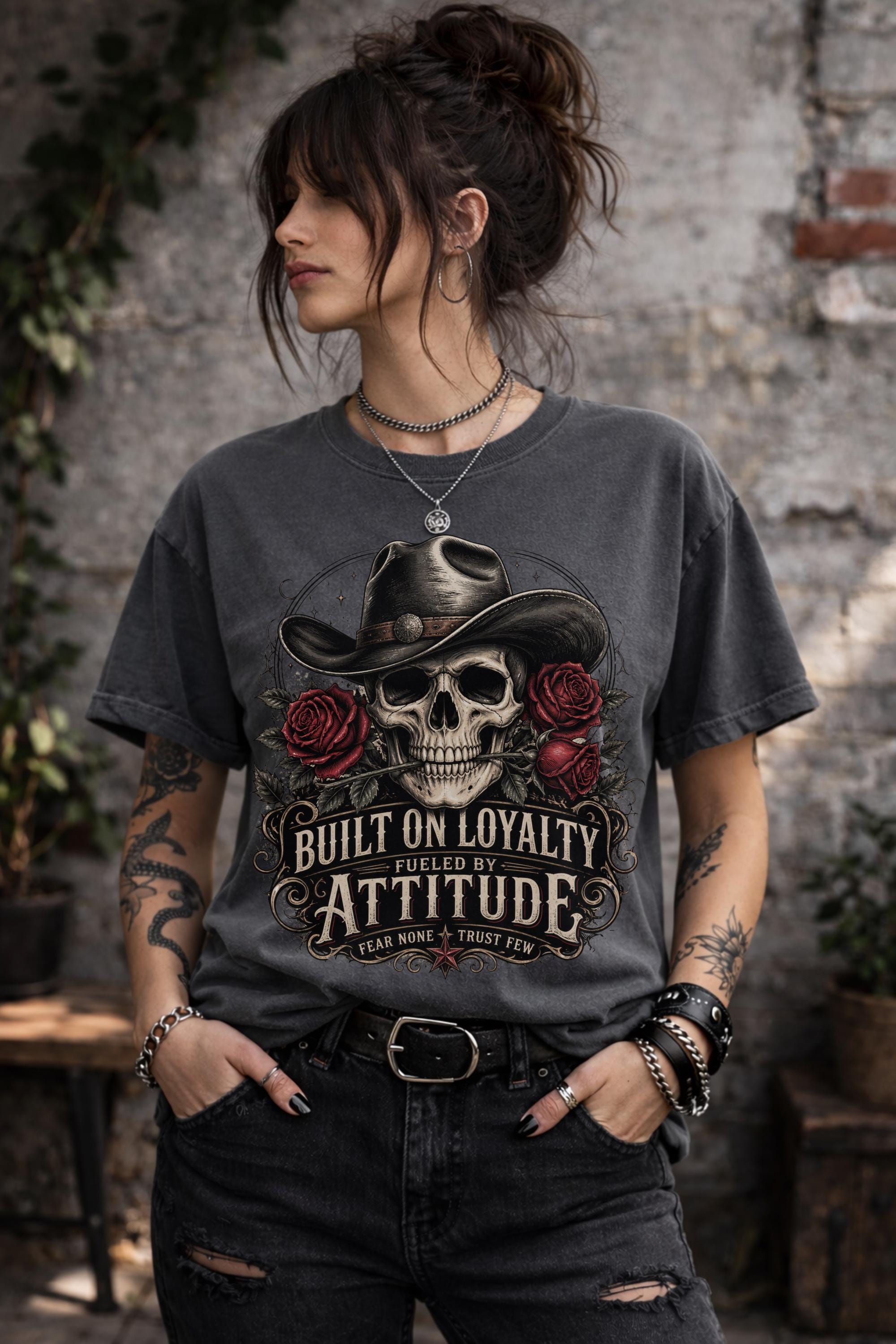 T-Shirt featuring cowboy skull with hat and red roses, Built on Loyalty Fueled by Attitude graphic, styled with edgy casual outfit