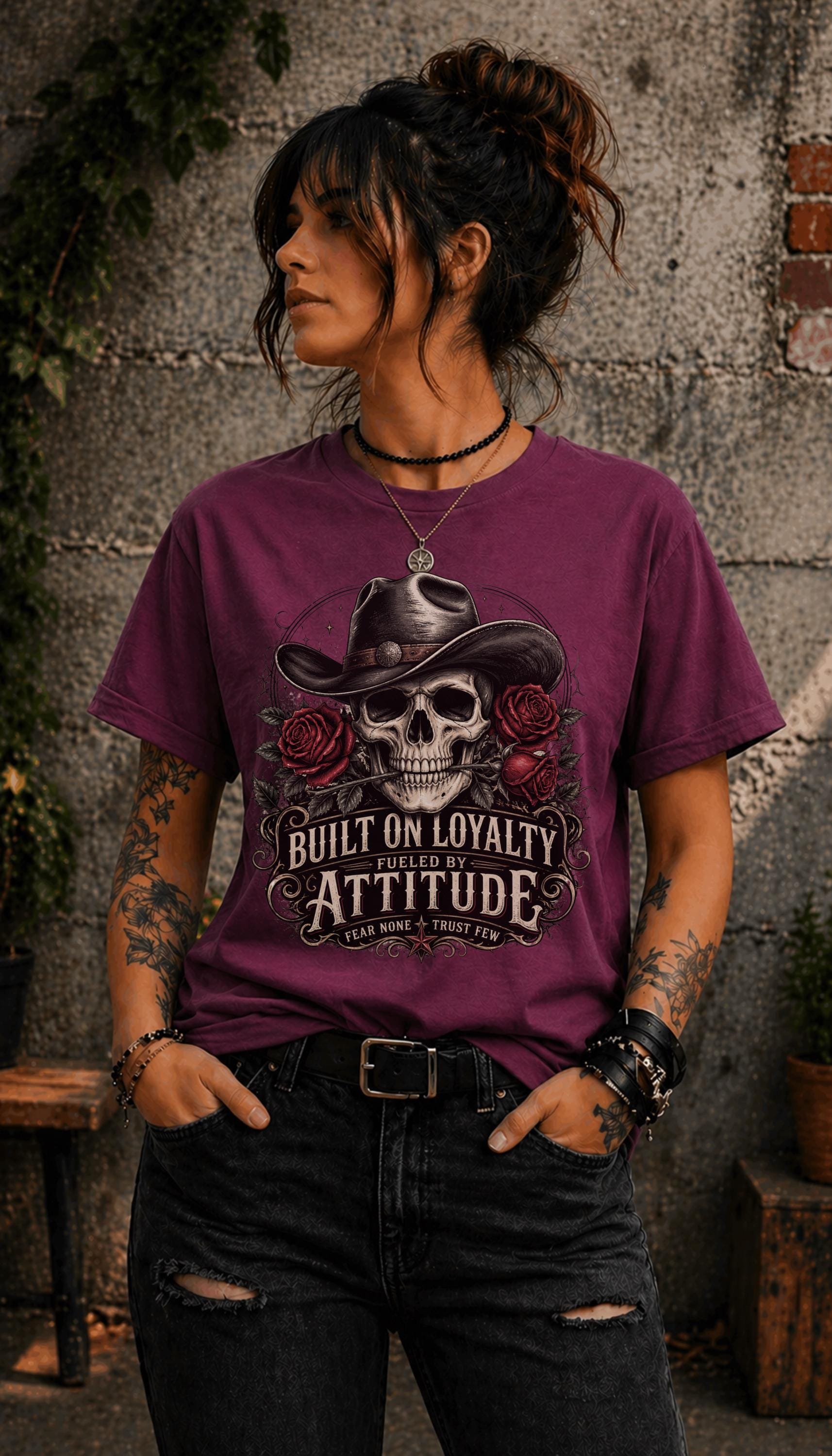 T-Shirt featuring cowboy skull with hat and red roses, Built on Loyalty Fueled by Attitude graphic, styled with edgy casual outfit