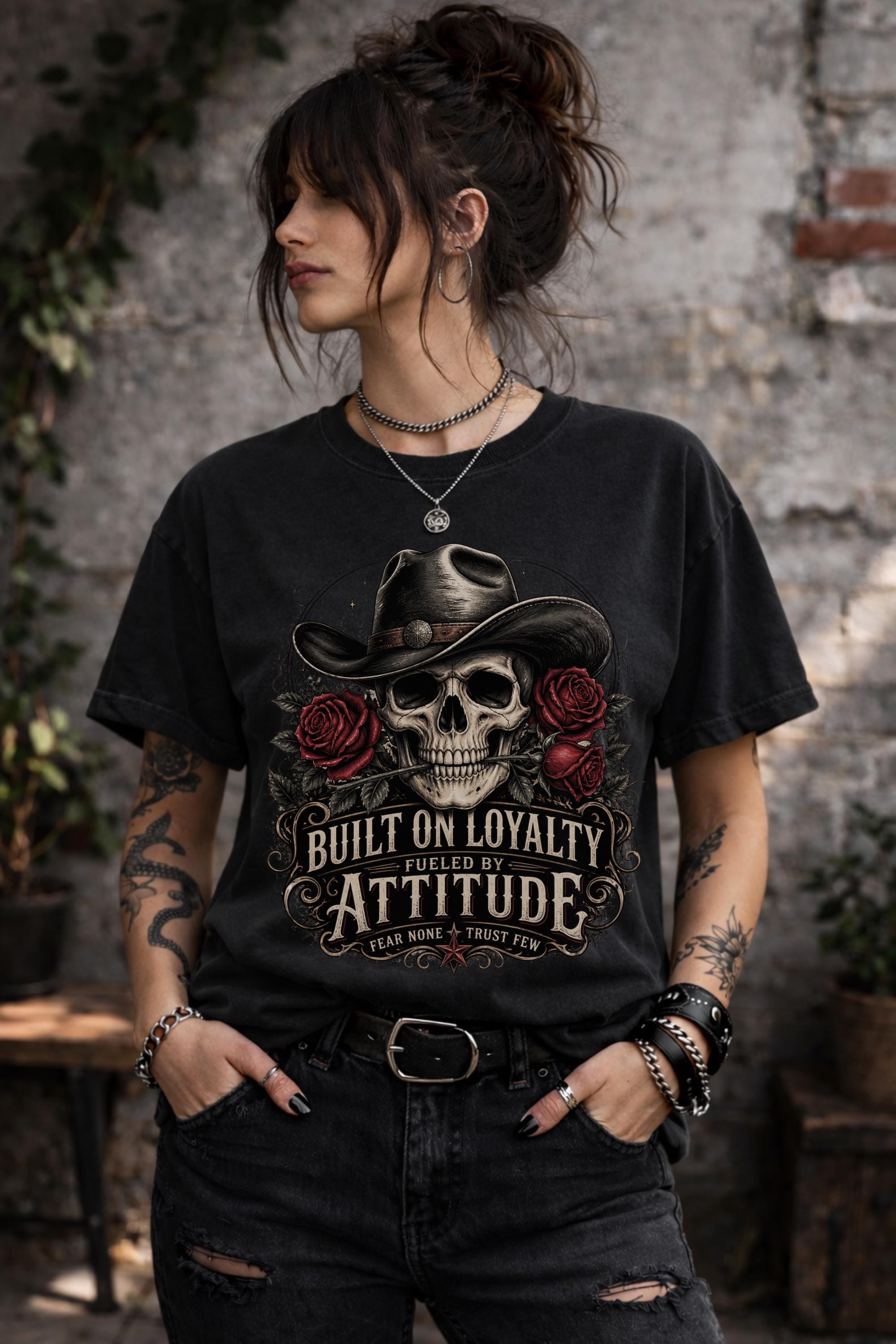 T-Shirt featuring cowboy skull with hat and red roses, Built on Loyalty Fueled by Attitude graphic, styled with edgy casual outfit