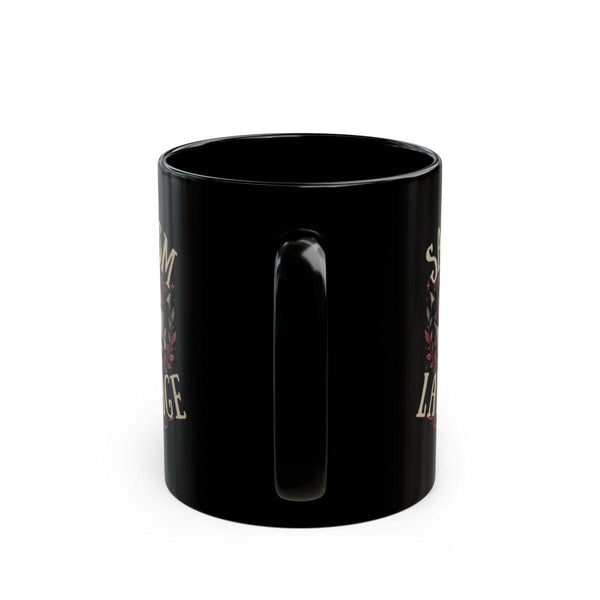 Black ceramic mug with sarcasm is my love language gothic heart design on rustic moody background with candle decor