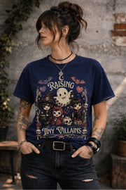 Alternative aesthetic graphic shirt featuring charming little monsters, ghost character, skull decorations, and gothic cottagecore vibes.