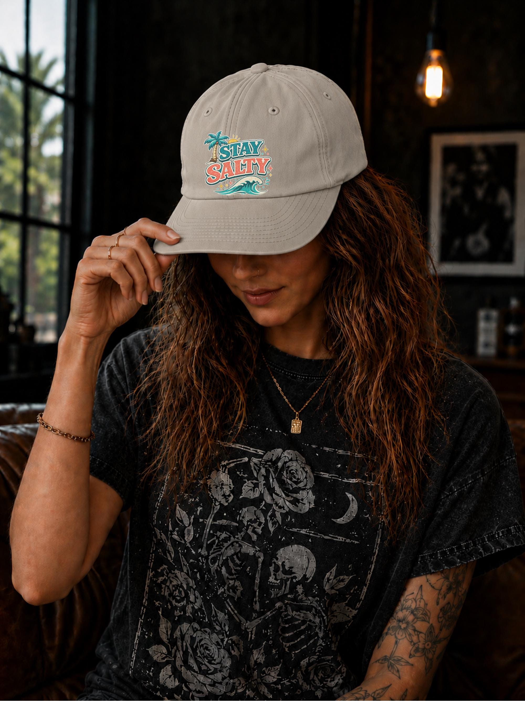 Summer beach cap showcasing Stay Salty graphic with ocean waves and tropical scenery