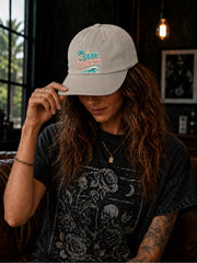 Summer beach cap showcasing Stay Salty graphic with ocean waves and tropical scenery