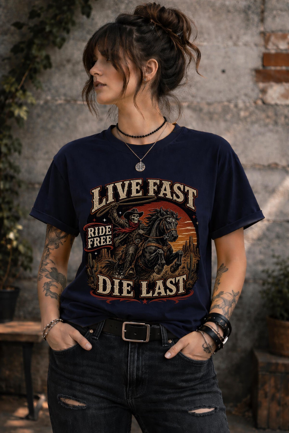 live fast die last shirt, skeleton cowboy tee, western rider shirt, outlaw graphic tee, cowboy skull design, rodeo apparel, country music shirt, horse lover gift, western fashion top, desert sunset graphic, ranch lifestyle tee, vintage outlaw shirt, comfort colors western tee