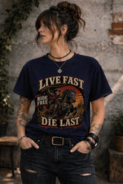 live fast die last shirt, skeleton cowboy tee, western rider shirt, outlaw graphic tee, cowboy skull design, rodeo apparel, country music shirt, horse lover gift, western fashion top, desert sunset graphic, ranch lifestyle tee, vintage outlaw shirt, comfort colors western tee