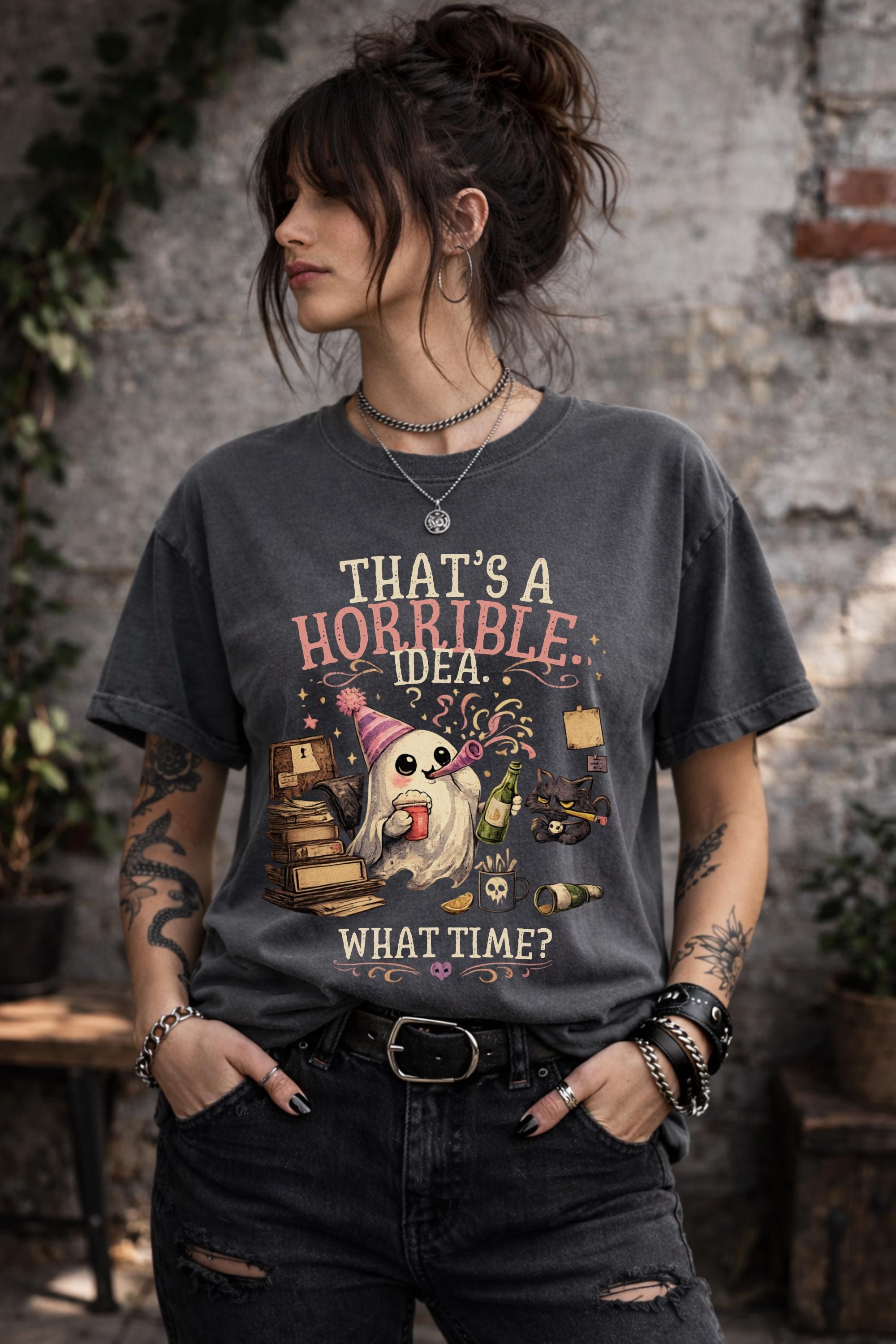 Sarcastic spooky graphic tee featuring ghost holding drink with books and Halloween aesthetic