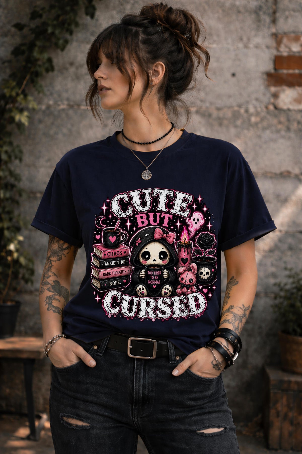 Cute But Cursed gothic kawaii graphic shirt featuring spooky character holding coffee mug