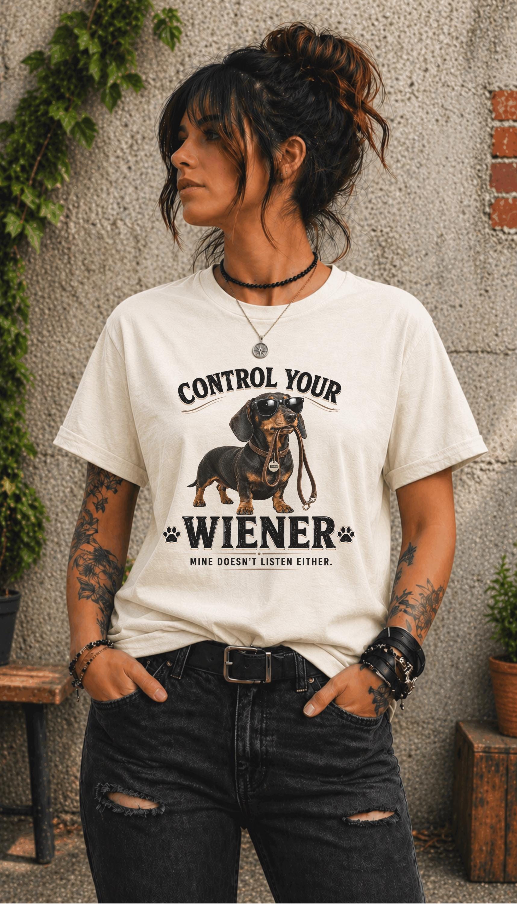 Dog lover graphic tee with adorable Dachshund holding leash design