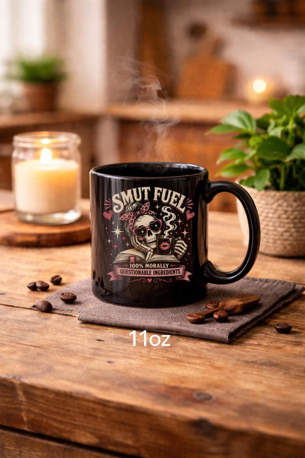 Black ceramic mug with Fueled by Smut and Caffeine design, funny dark romance book lover coffee mug gift