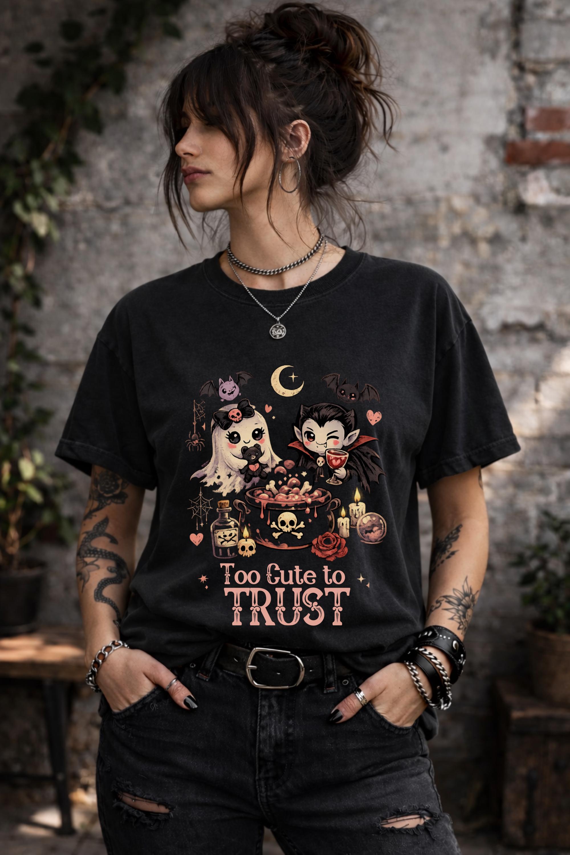 Alternative Halloween graphic shirt showcasing cute supernatural characters, magical potions, bats, hearts, and gothic aesthetic artwork.