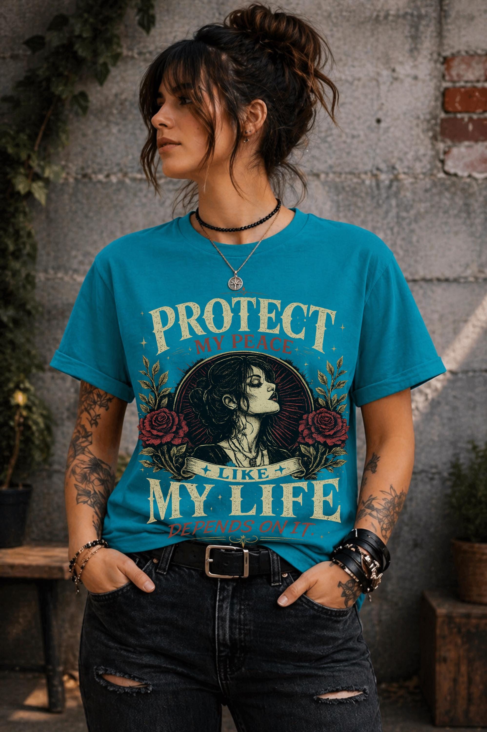 Vintage-inspired shirt featuring the phrase "Protect My Peace Like My Life Depends On It" with gothic floral artwork and an empowering self-care theme.