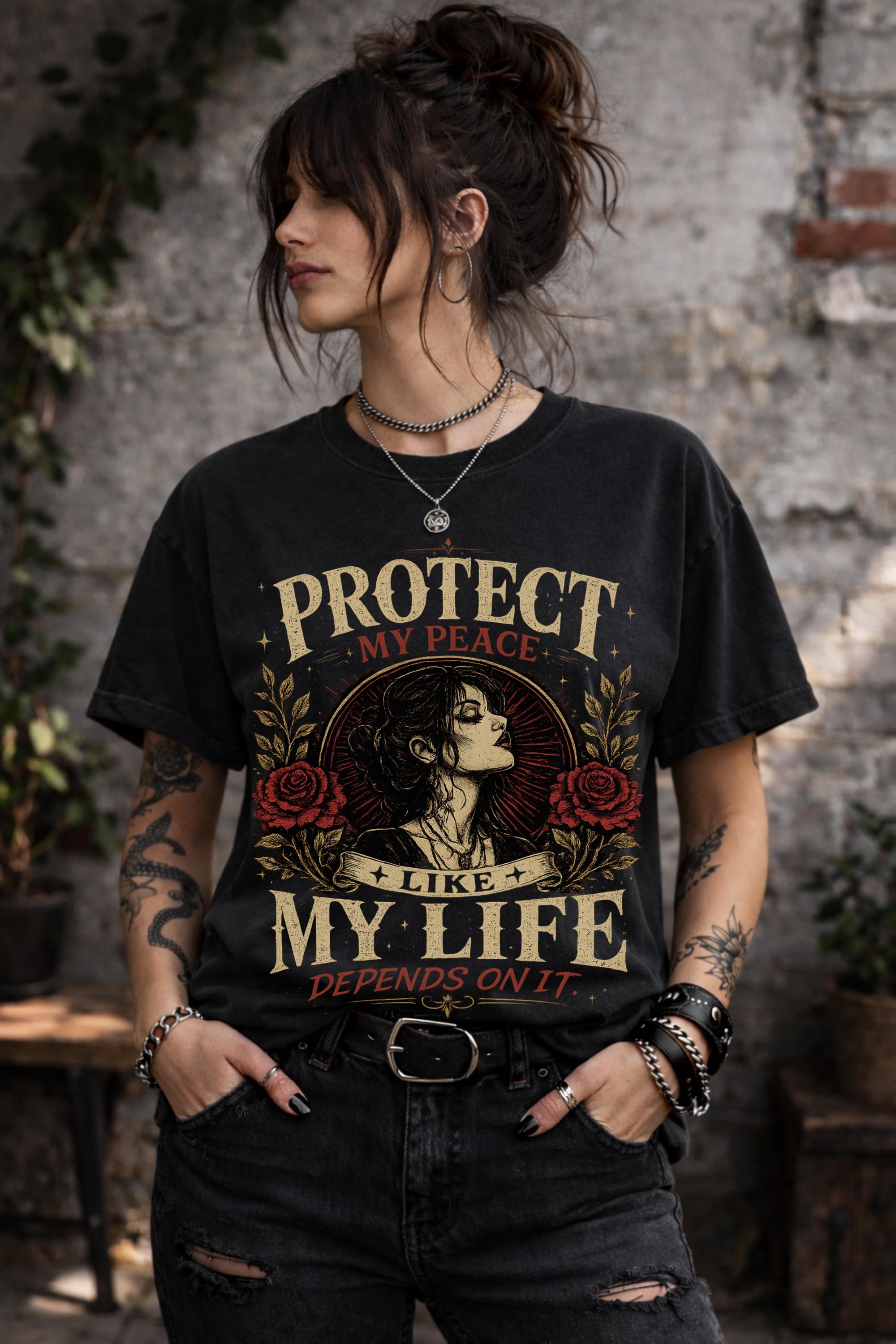Vintage-inspired shirt featuring the phrase "Protect My Peace Like My Life Depends On It" with gothic floral artwork and an empowering self-care theme.