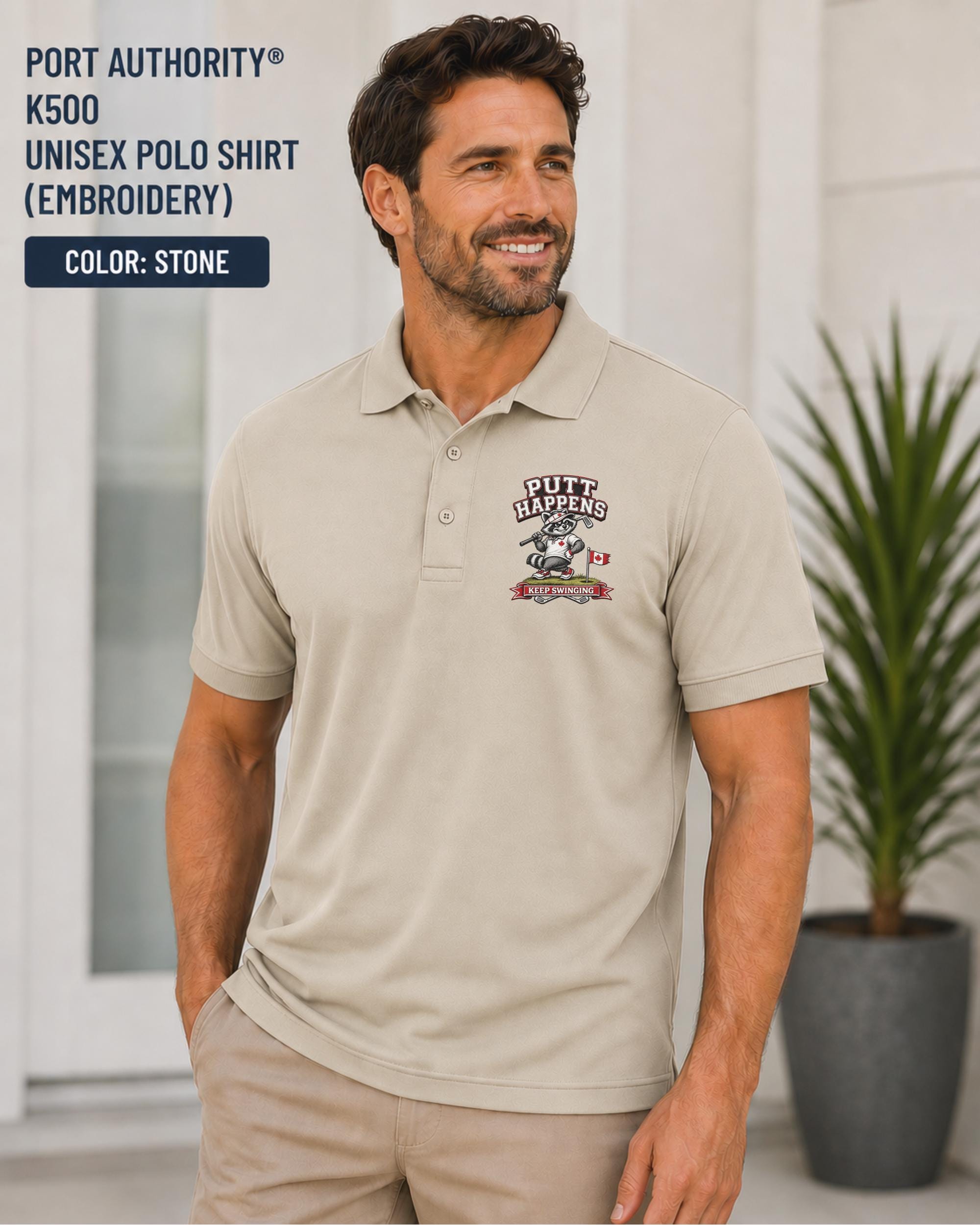 Stone Port Authority K500 embroidered golf polo featuring a funny raccoon golfer design with the phrase Putt Happens and Keep Swinging