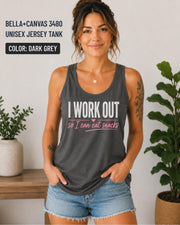 Woman wearing a dark grey Bella+Canvas jersey tank featuring the phrase "I Work Out So I Can Eat Snacks" in white and pink lettering.