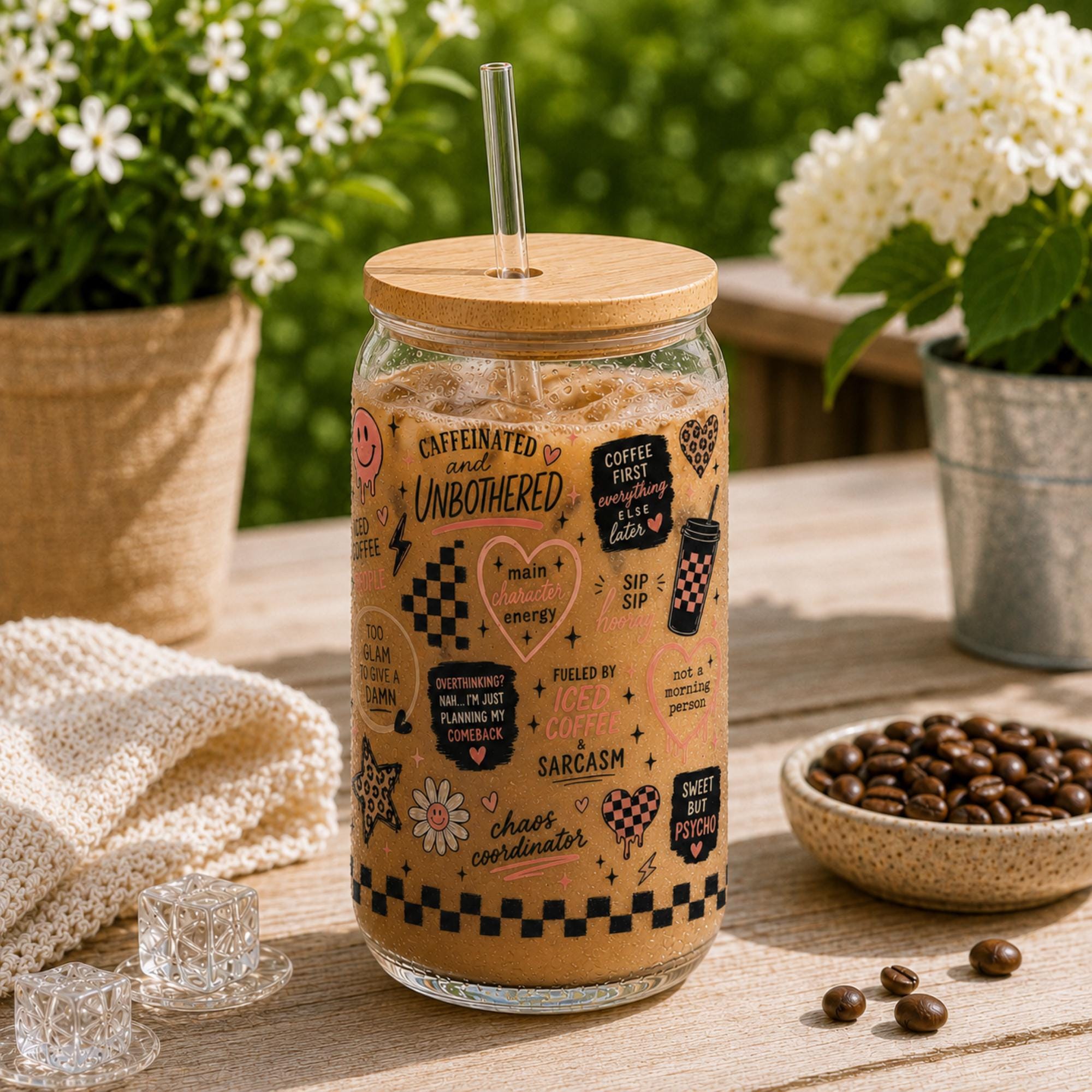 Cute iced coffee cup covered in coffee inspired sayings and graphics