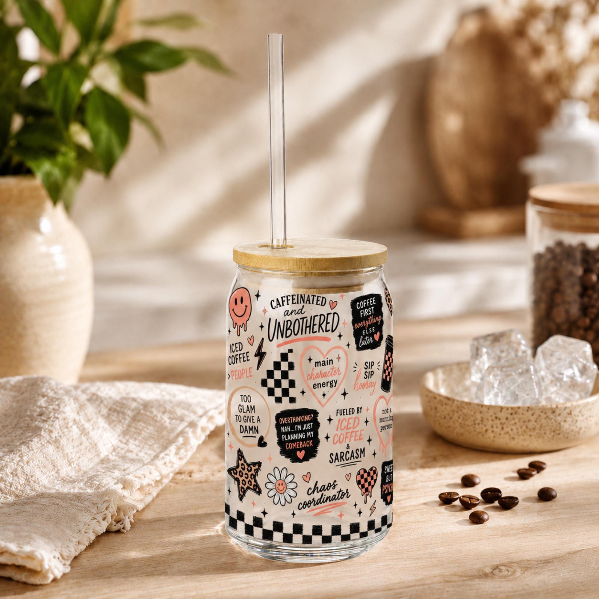 Glass can drinkware featuring checkerboard accents and smiley faces