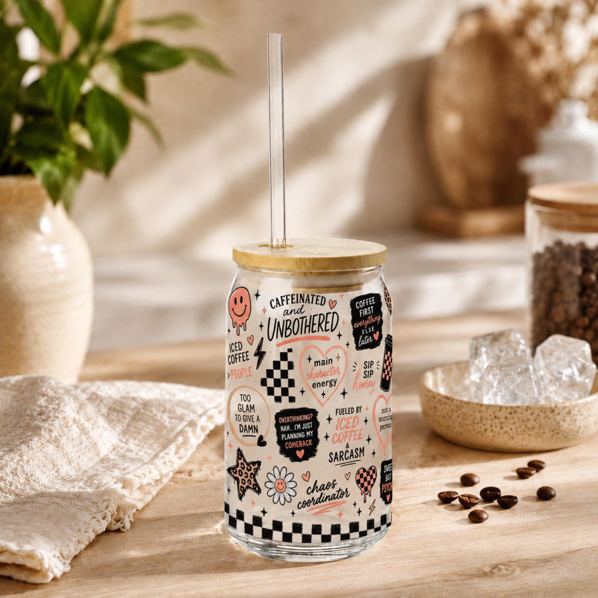 Glass can drinkware featuring checkerboard accents and smiley faces