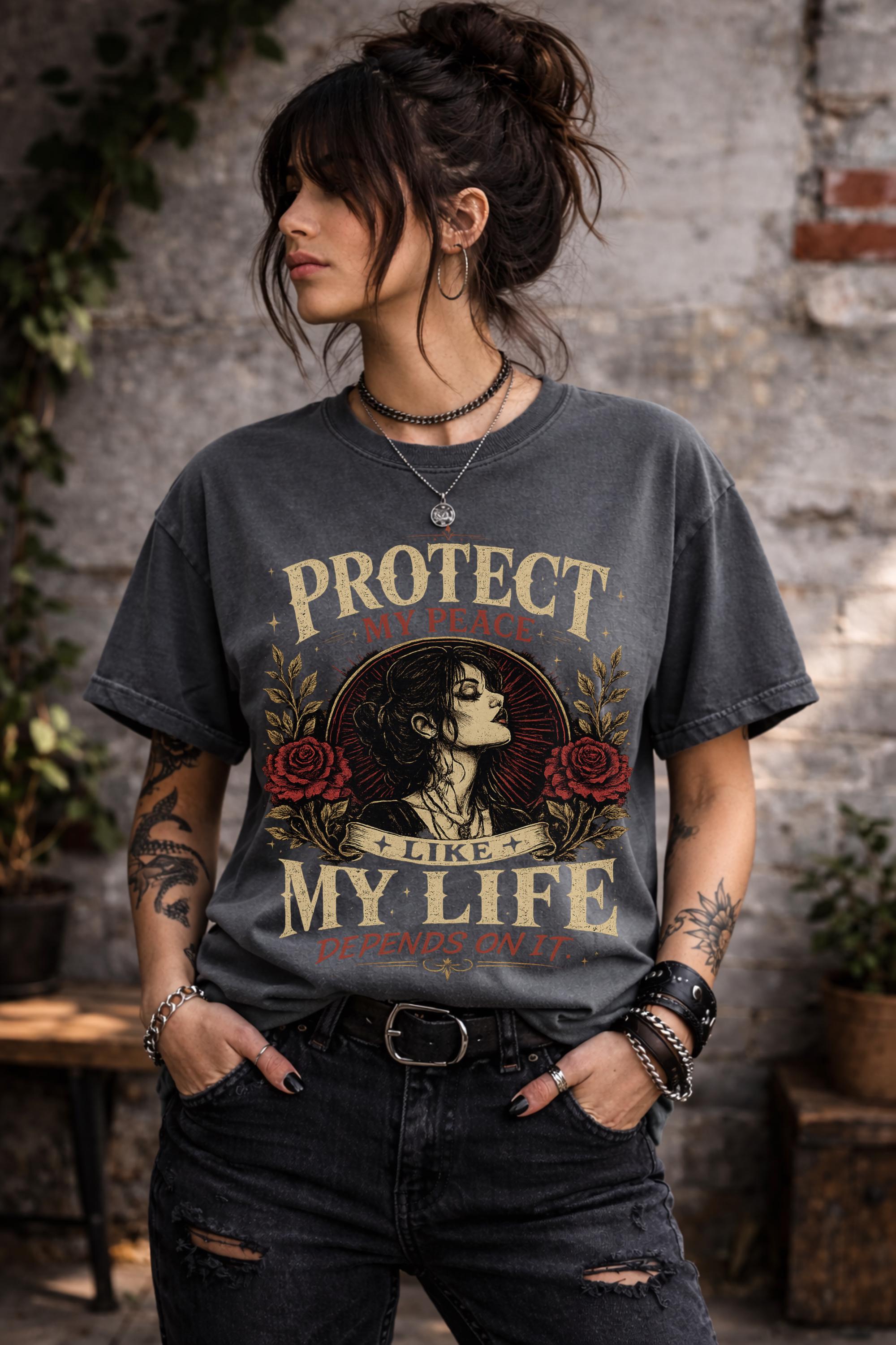 Vintage-inspired shirt featuring the phrase "Protect My Peace Like My Life Depends On It" with gothic floral artwork and an empowering self-care theme.