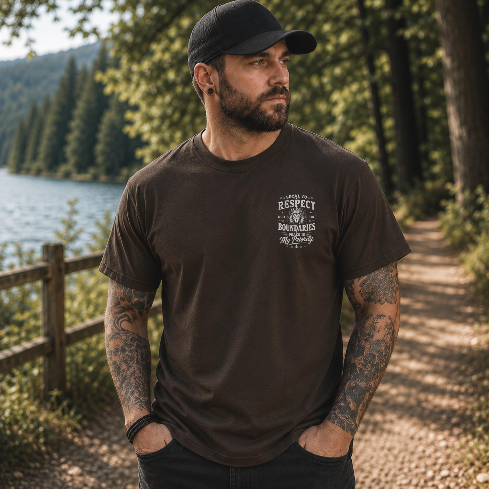 Front view of a shirt featuring the humorous phrase "loyal to respect built on boundaries peace is my priority", and on the back "I'm Friendly But My Wife Isn't" in distressed white typography.