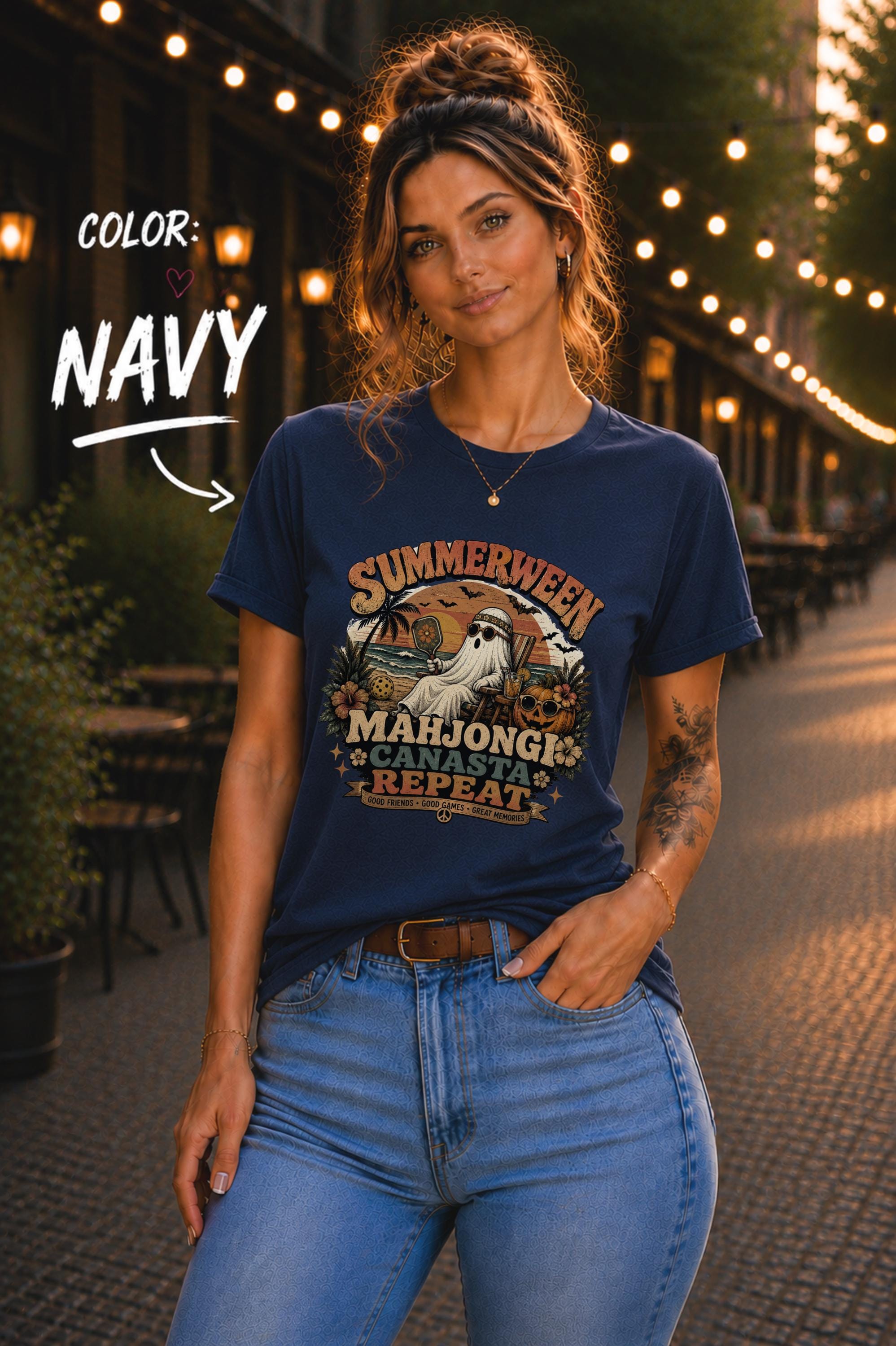 Vintage-style Summerween graphic tee with ghost, beach sunset, tropical flowers, and game night theme.