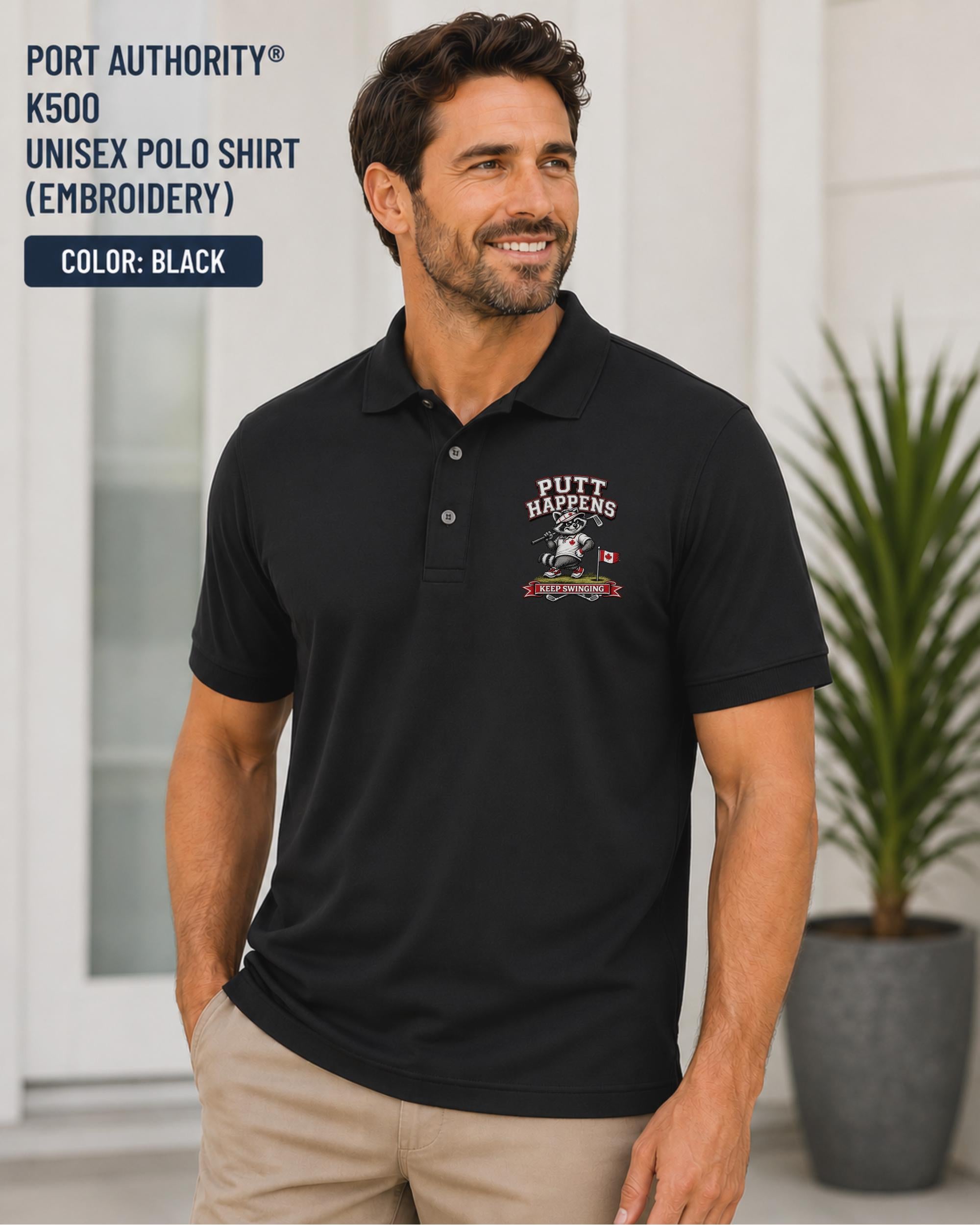 Black Port Authority K500 embroidered golf polo featuring a funny raccoon golfer design with the phrase Putt Happens and Keep Swinging