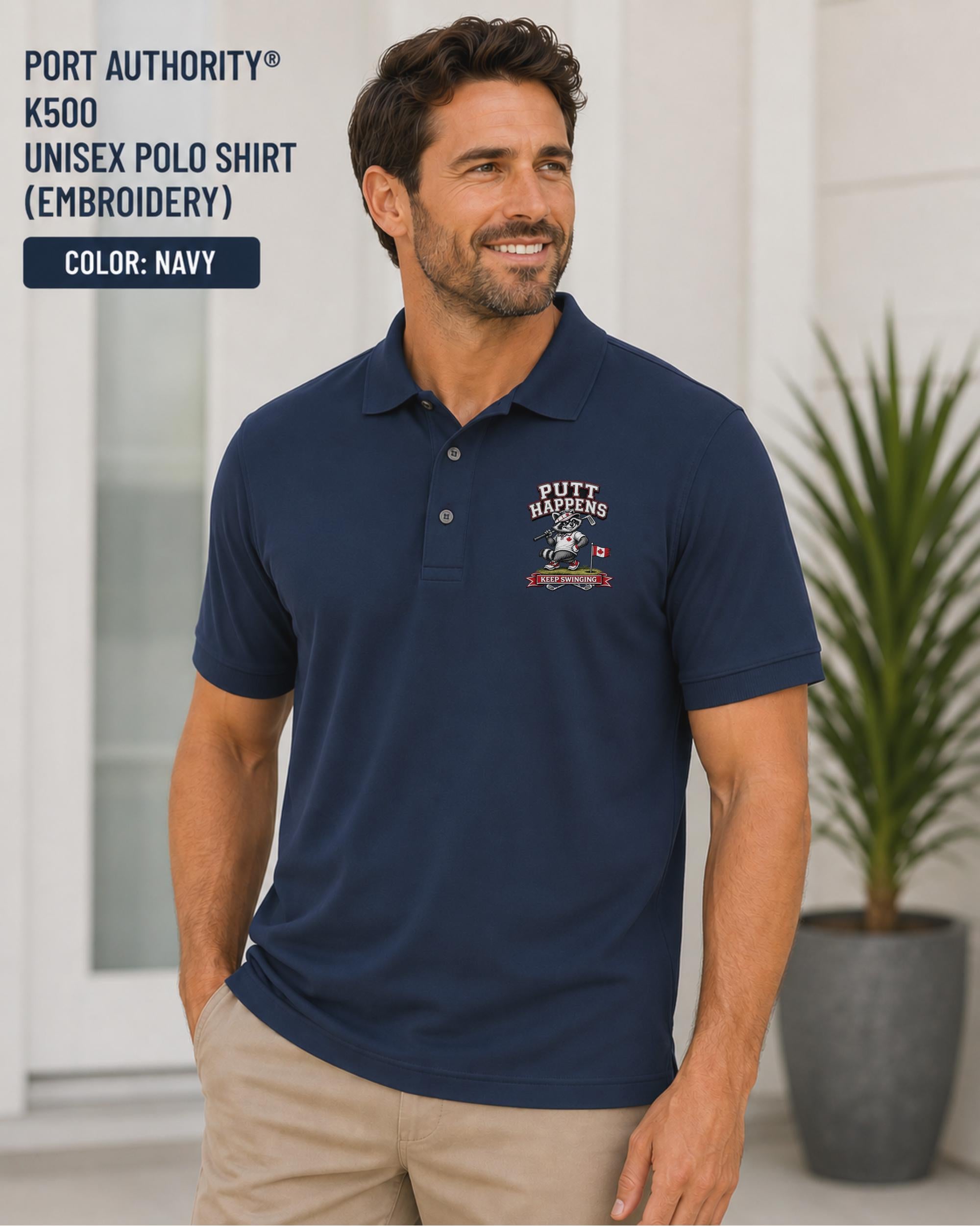 Navy Port Authority K500 embroidered golf polo featuring a funny raccoon golfer design with the phrase Putt Happens and Keep Swinging