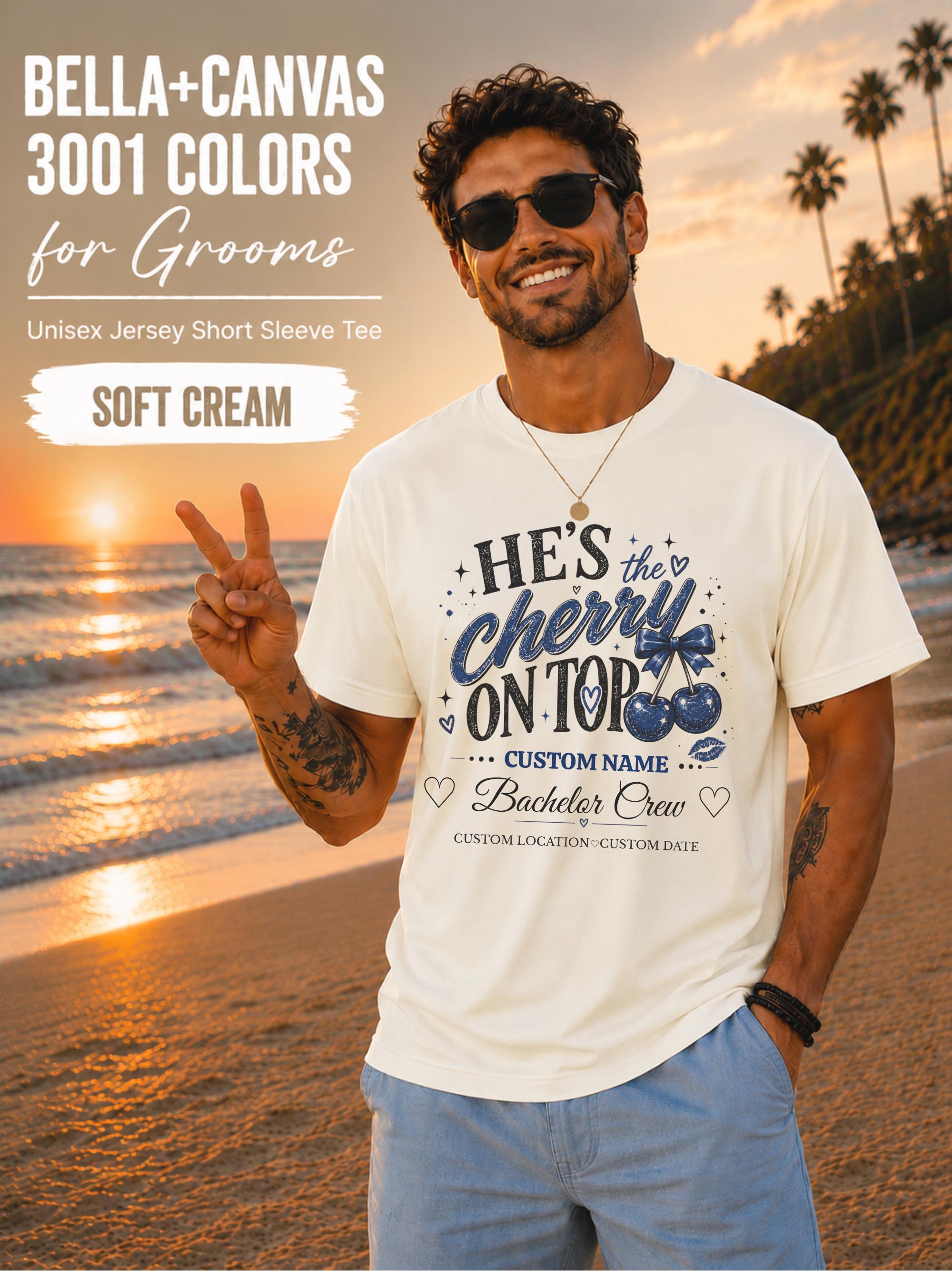 Bella+Canvas 3001 Soft Cream unisex T-shirt featuring a customizable "He's the Cherry on Top" bachelor crew design with blue cherries, custom name, location, and wedding date for bachelor party celebrations.