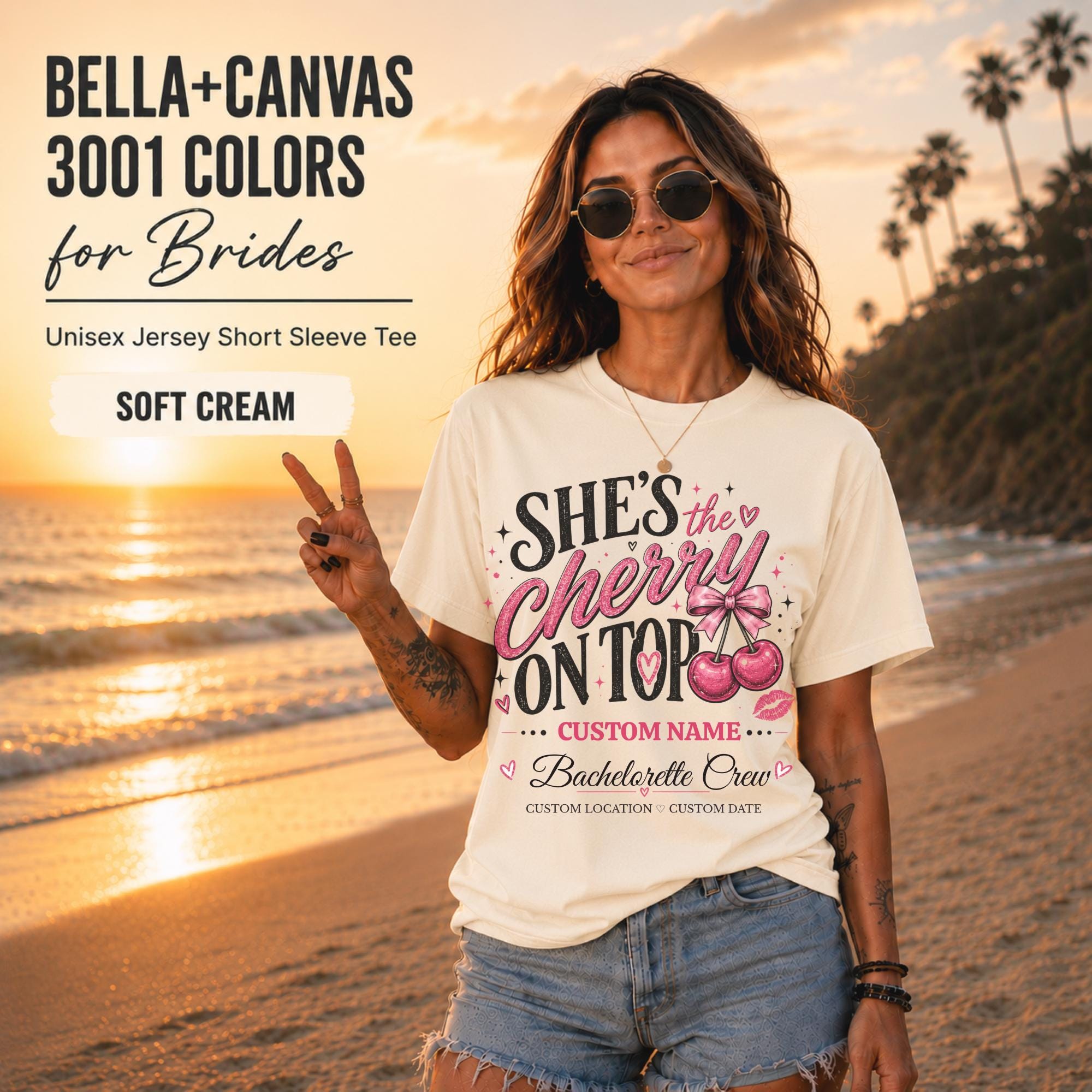 Bella+Canvas 3001 Soft Creamunisex T-shirt featuring a customizable "She's the Cherry on Top" bachelorette crew design with pink cherries, custom name, location, and wedding date for bridal party celebrations.