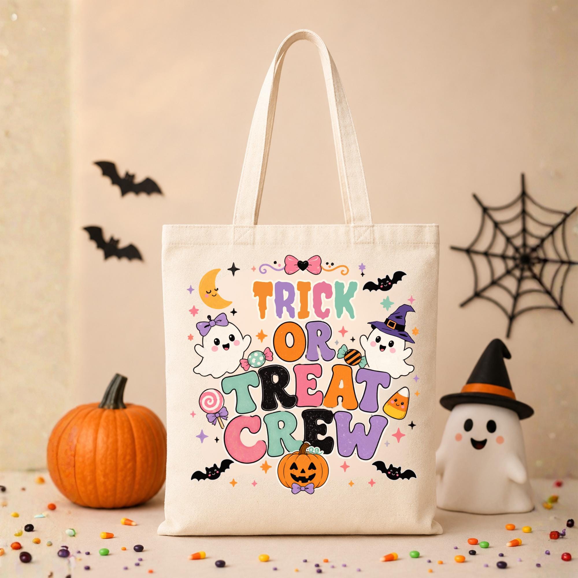 Kids Halloween Trick or Treat tote bag size chart featuring black and natural heavyweight cotton canvas tote bags with colorful ghost, pumpkin, bat, and candy design, product dimensions, features, and care instructions.