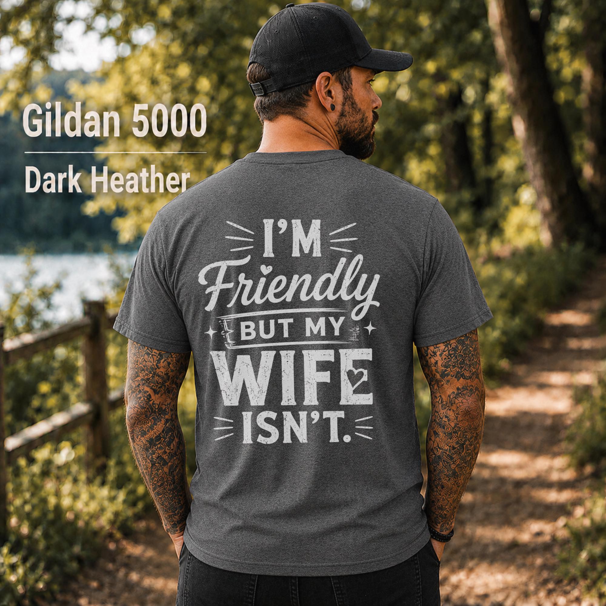 Funny husband t-shirt with "I'm Friendly But My Wife Isn't" back print on a dark heather Gildan 5000 unisex tee, humorous men's graphic shirt for husbands, dads, and Father's Day gifts.