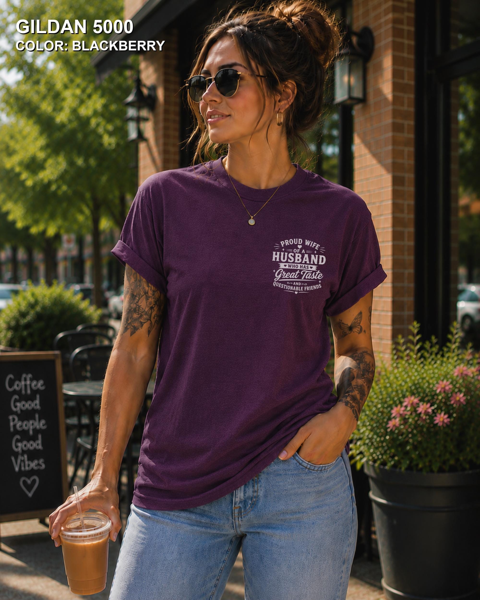 Blackberry Gildan 5000 unisex t-shirt with a small left chest graphic reading "Proud Wife of a Husband Who Has Great Taste and Questionable Friends," funny couple apparel.