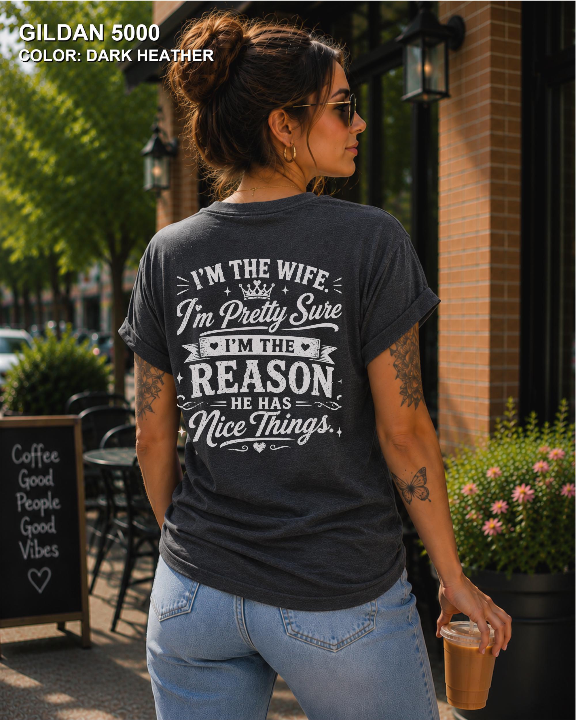 Women's funny wife t-shirt featuring "I'm the Wife, I'm Pretty Sure I'm the Reason He Has Nice Things" back graphic on a Dark Heather Gildan 5000 tee, humorous marriage shirt for wives.