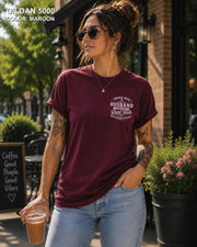 Maroon Gildan 5000 unisex t-shirt with a small left chest graphic reading "Proud Wife of a Husband Who Has Great Taste and Questionable Friends," funny couple apparel.