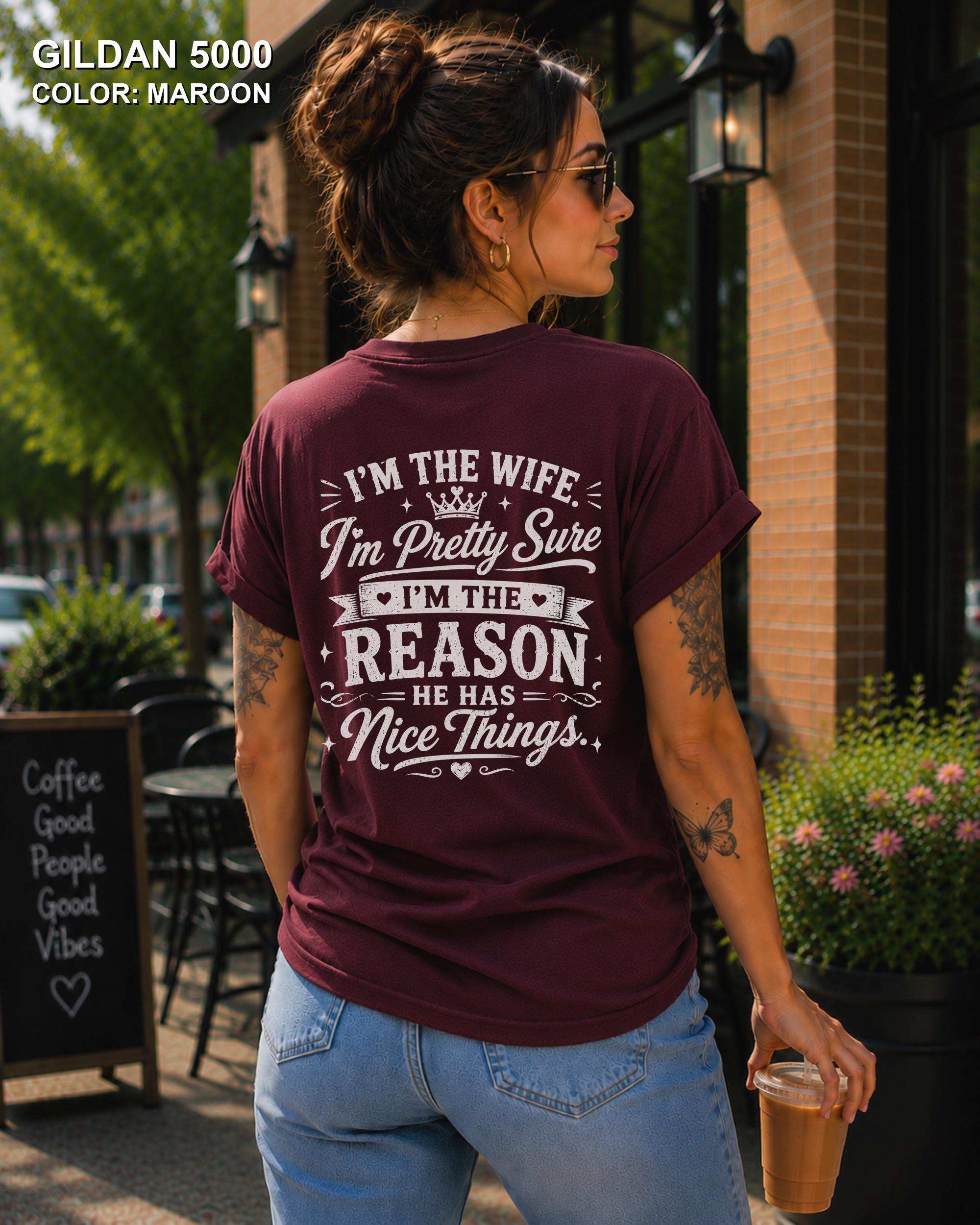 Women's funny wife t-shirt featuring "I'm the Wife, I'm Pretty Sure I'm the Reason He Has Nice Things" back graphic on a maroon Gildan 5000 tee, humorous marriage shirt for wives.