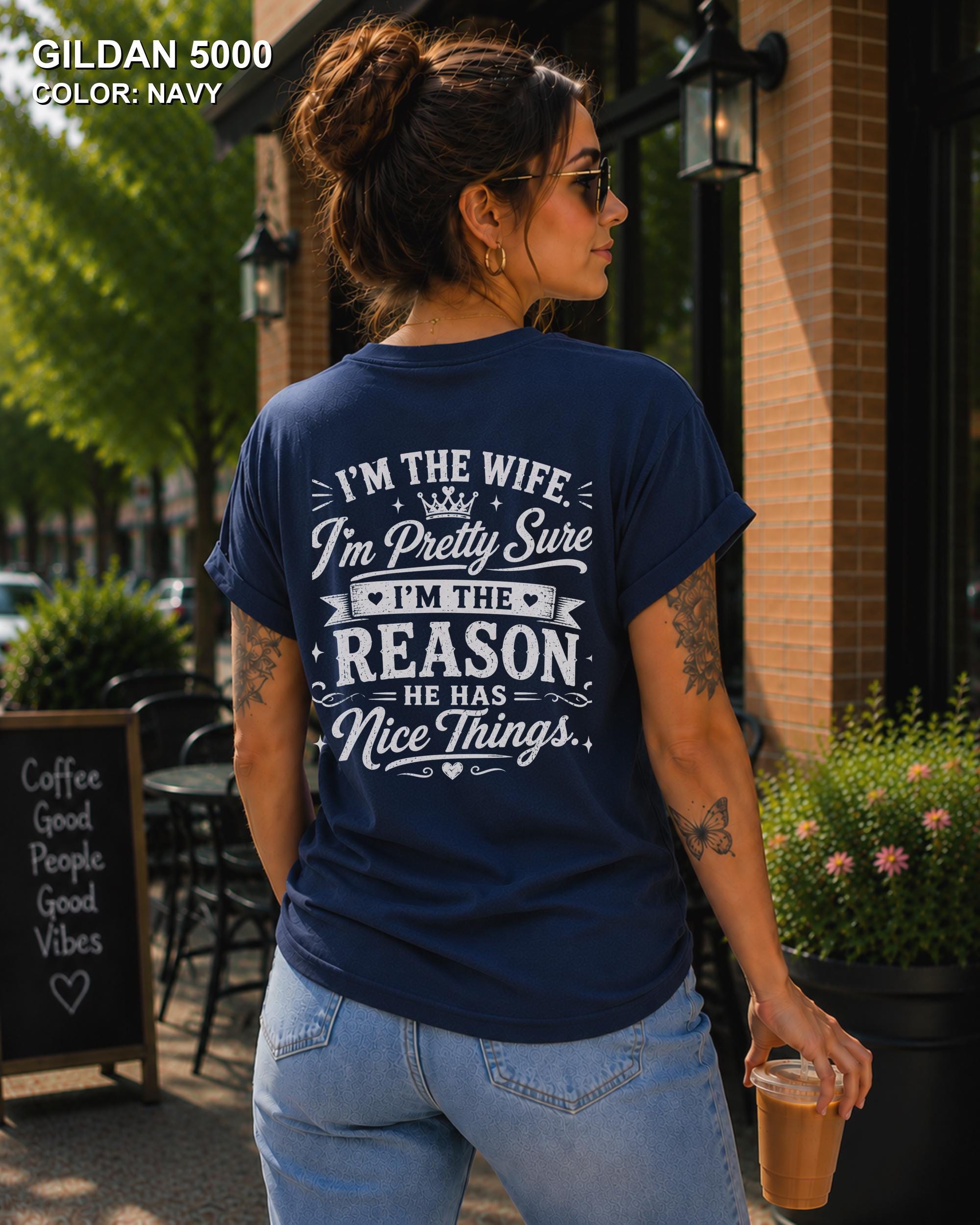 Women's funny wife t-shirt featuring "I'm the Wife, I'm Pretty Sure I'm the Reason He Has Nice Things" back graphic on a navy Gildan 5000 tee, humorous marriage shirt for wives.