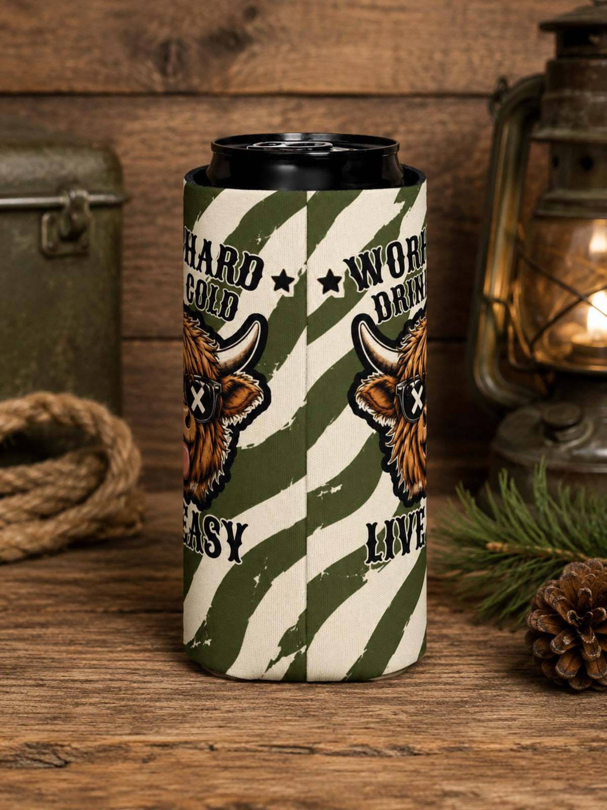 Rustic camping-themed mockup of Highland cow side view of the can cooler.
