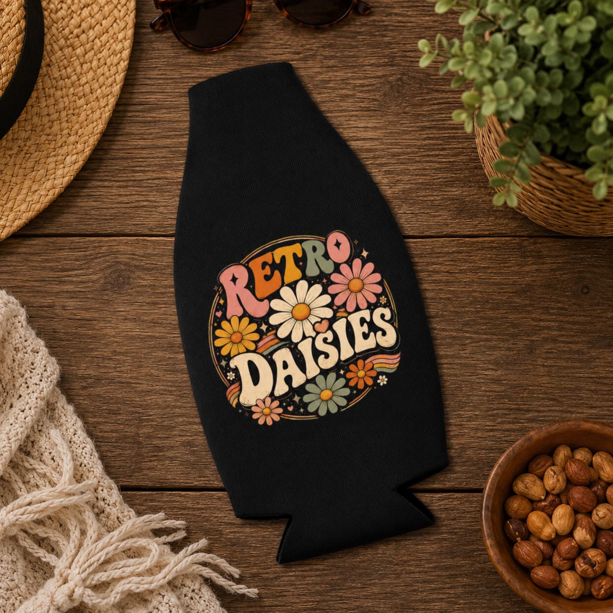 Hippie-inspired bottle cooler with colorful daisy artwork and vintage aesthetic.