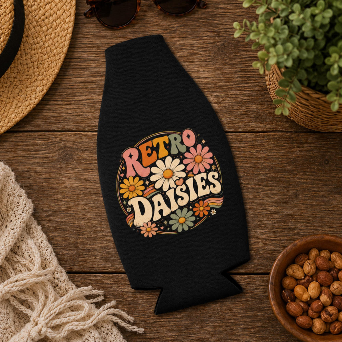 Hippie-inspired bottle cooler with colorful daisy artwork and vintage aesthetic.