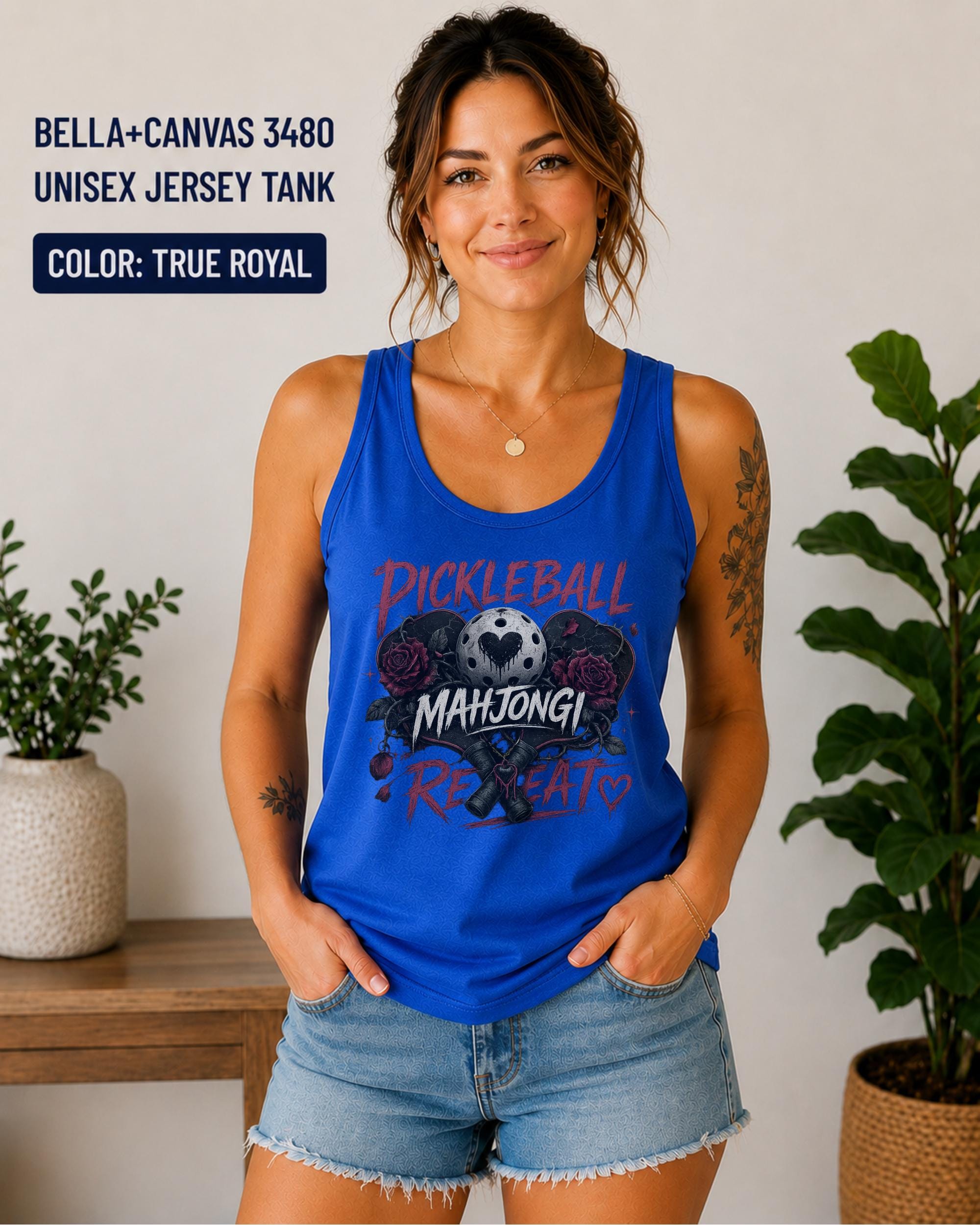 Woman wearing a True Royal Bella+Canvas 3480 jersey tank featuring a gothic "Pickleball Mahjong Repeat" design with burgundy roses, distressed lettering, crossed paddles, and a heart-detail pickleball.