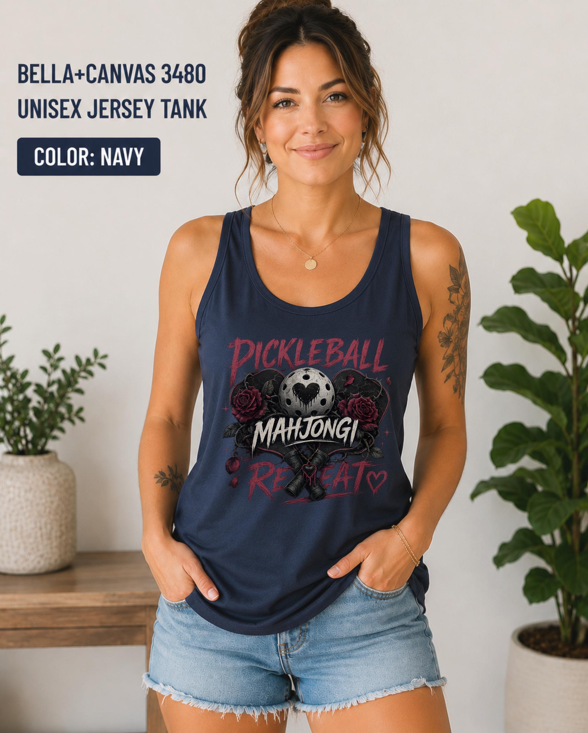 Woman wearing a navy Bella+Canvas 3480 jersey tank featuring a gothic "Pickleball Mahjong Repeat" design with burgundy roses, distressed lettering, crossed paddles, and a heart-detail pickleball.