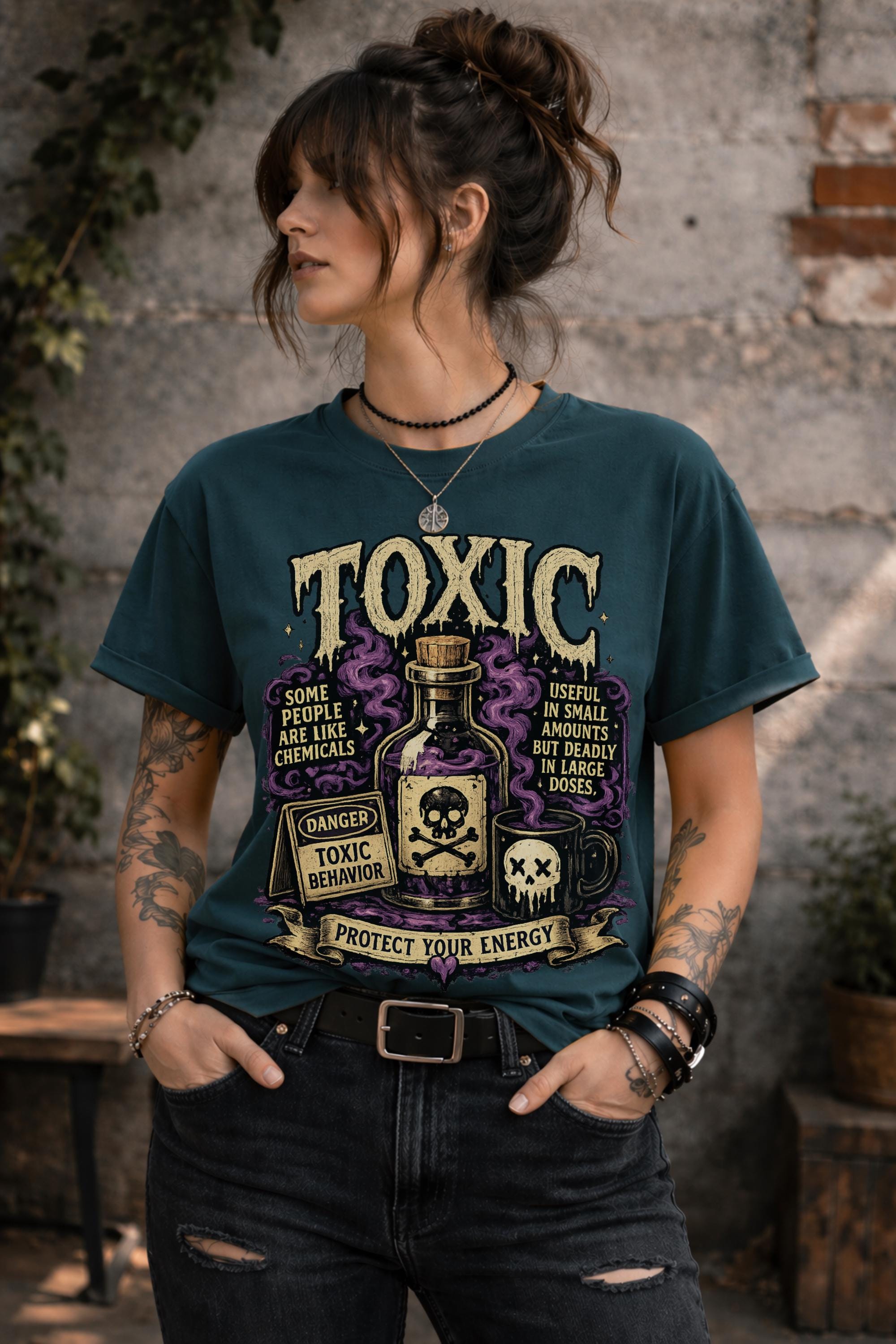 Female model wearing dark humor boundary-setting shirt with vintage toxic chemical bottle artwork