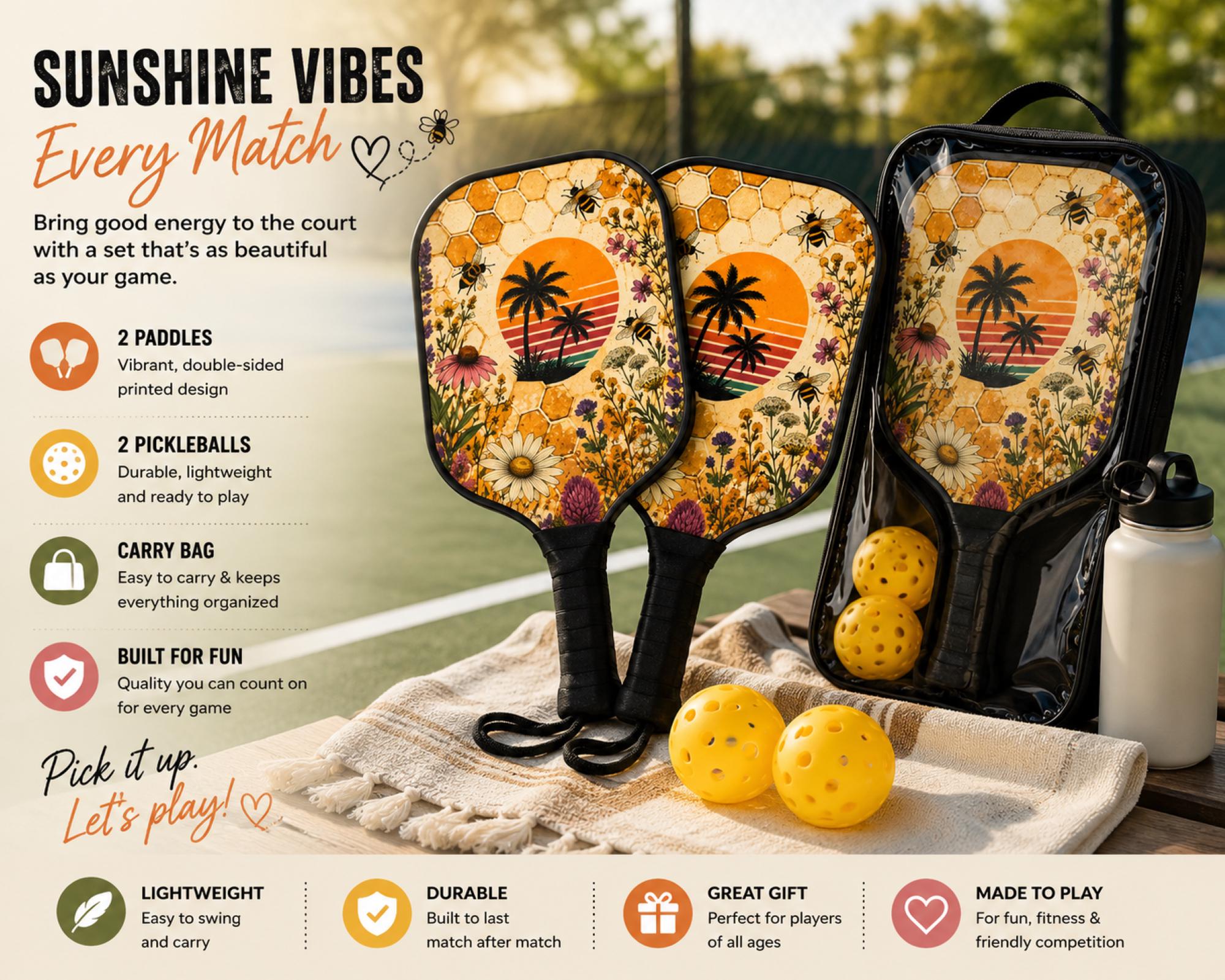 Tropical pickleball paddle with bees, wildflowers, palm tree sunset, and honeycomb artwork on an outdoor court.